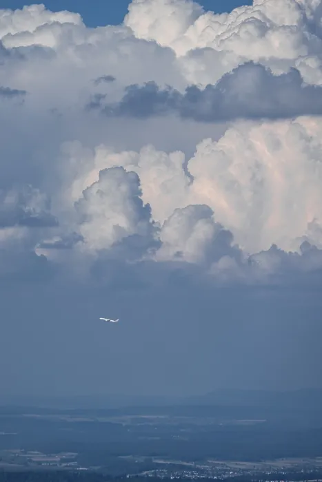 Framed Print : Plane in front of dramatic clouds, Switzerland Print Framed Print : Plane in front of dramatic clouds, Switzerland Print