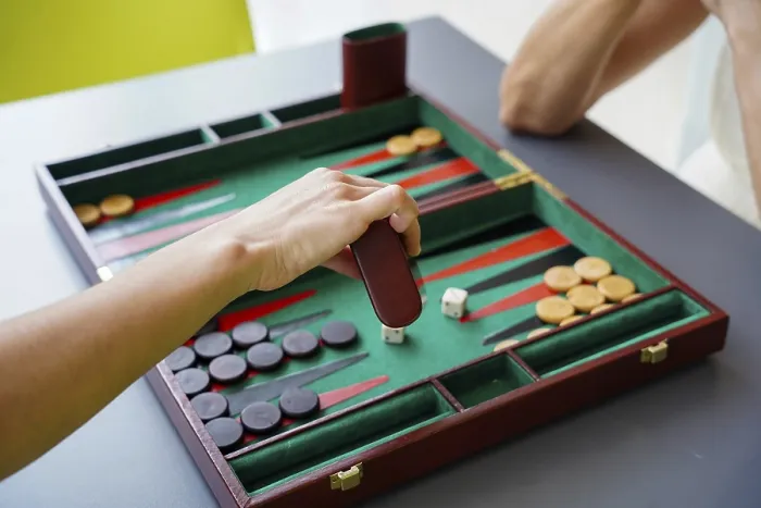 Framed Print : Backgammon Player in Concentrated Moment Print Framed Print : Backgammon Player in Concentrated Moment Print