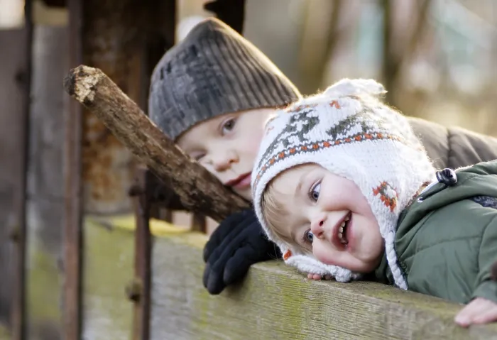Framed Print : Playing Siblings Print by imageBROKER Framed Print : Playing Siblings Print by imageBROKER