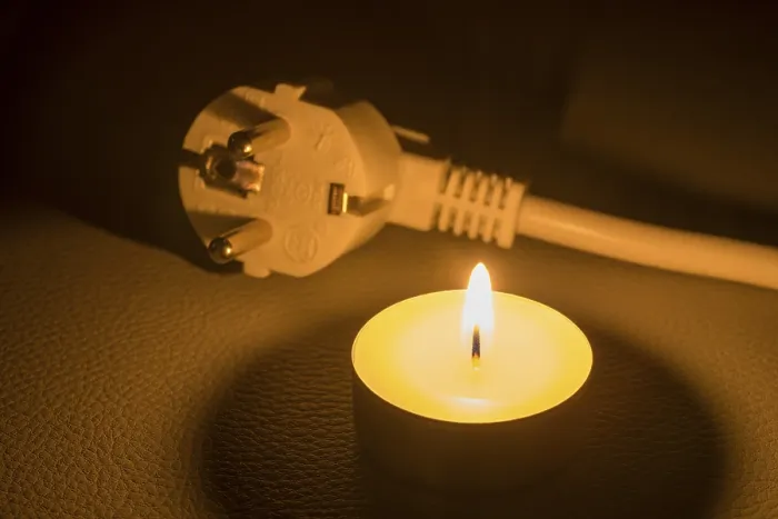 Framed Print : A Plug Next to a Burning Candle Print Framed Print : A Plug Next to a Burning Candle Print