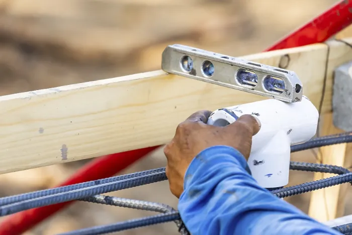 Framed Print : Plumber using level while installing PVC pipe Print Framed Print : Plumber using level while installing PVC pipe Print