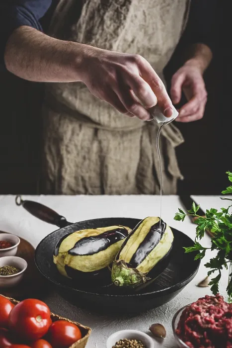 Framed Print : Preparing Eggplants for Baking Print - Olive Oil Pouring Framed Print : Preparing Eggplants for Baking Print - Olive Oil Pouring