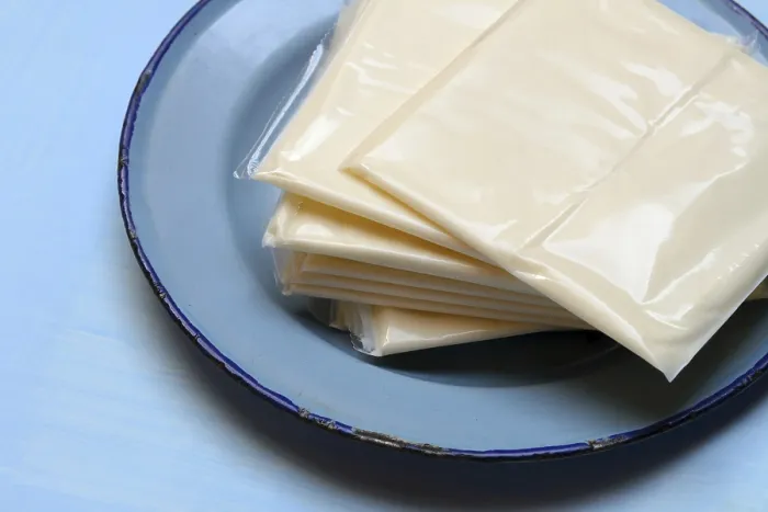 Framed Print : Processed Cheese Print: Plastic Packed Slices Framed Print : Processed Cheese Print: Plastic Packed Slices