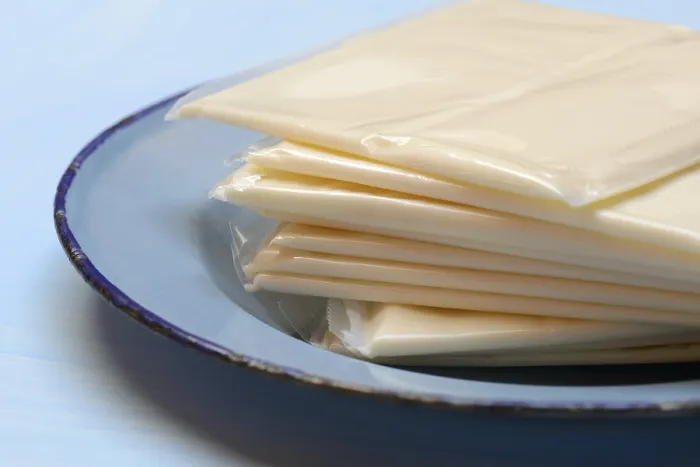 Framed Print : Processed Cheese Print: Plastic Packaged Slices Framed Print : Processed Cheese Print: Plastic Packaged Slices