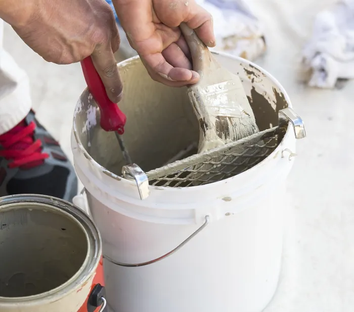Framed Print : Professional Painter Loading Paint from Bucket Print Framed Print : Professional Painter Loading Paint from Bucket Print