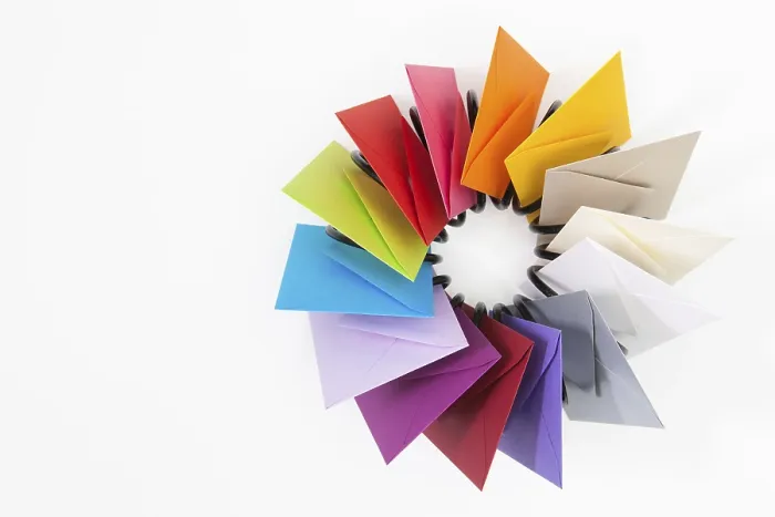 Framed Print : Propeller of Colored Envelopes Print on White Table Framed Print : Propeller of Colored Envelopes Print on White Table