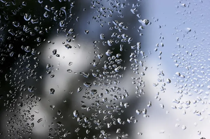 Framed Print : Rain Drops on Window as the Clouds Clear Behind - Print Framed Print : Rain Drops on Window as the Clouds Clear Behind - Print