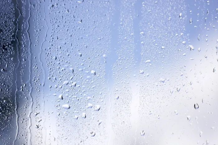Framed Print : Rain Drops on Window as the Clouds Clear Behind - Print Framed Print : Rain Drops on Window as the Clouds Clear Behind - Print