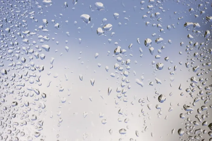 Framed Print : Rain Drops on Window as the Clouds Clear Behind - Print Framed Print : Rain Drops on Window as the Clouds Clear Behind - Print