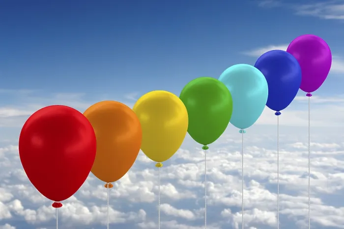 Framed Print : Rainbow-Coloured Balloons Print Against Blue Sky Framed Print : Rainbow-Coloured Balloons Print Against Blue Sky