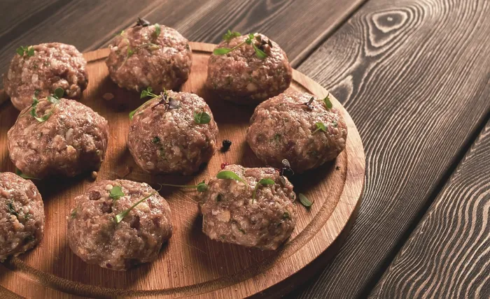 Framed Print : Raw Meatballs Print with Micro Greenery on Cutting Board Framed Print : Raw Meatballs Print with Micro Greenery on Cutting Board