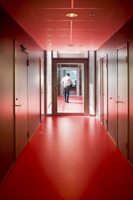 Framed Print : Red Corridor Print - Institution Framed Print : Red Corridor Print - Institution