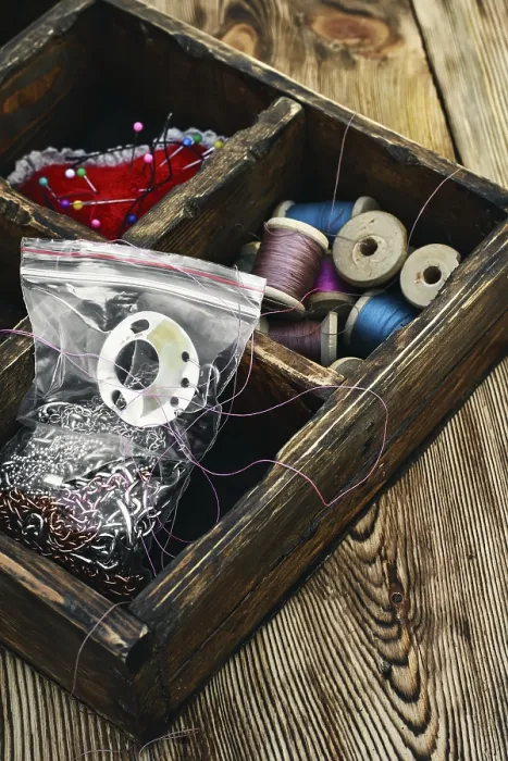 Framed Print : Retro Composition Print with Buttons and Thread in Wooden Box Framed Print : Retro Composition Print with Buttons and Thread in Wooden Box