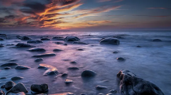 Framed Print : Rocks on a beach at sunset print, Rgen island, Germany Framed Print : Rocks on a beach at sunset print, Rgen island, Germany