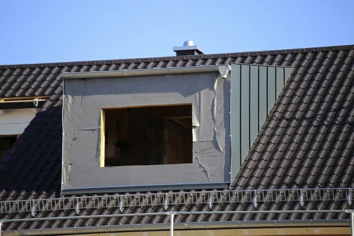Framed Print : Roofer working on a new dormer window Print Framed Print : Roofer working on a new dormer window Print