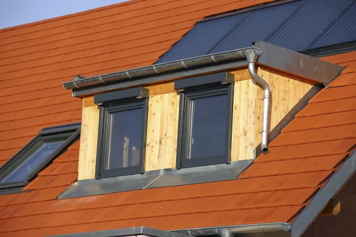 Framed Print : Roofer Working on a New Dormer Window Print