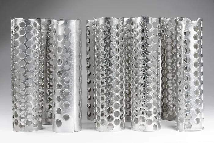 Framed Print : Rows of metallic curlers Print Framed Print : Rows of metallic curlers Print
