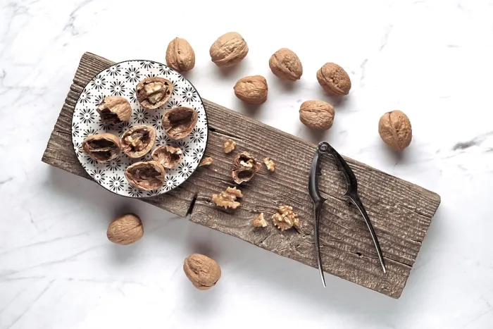 Framed Print : Walnuts on a Patterned Plate Print