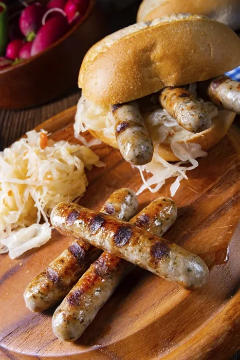 Framed Print : Rustic Thuringian Bratwurst with Sauerkraut and Roll Print Framed Print : Rustic Thuringian Bratwurst with Sauerkraut and Roll Print