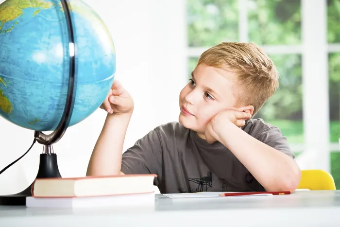 Framed Print : A School Boy with a Globe Print Framed Print : A School Boy with a Globe Print