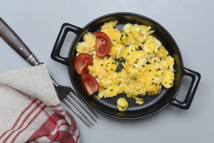 Framed Print : Scrambled eggs with tomatoes in a pan print Framed Print : Scrambled eggs with tomatoes in a pan print