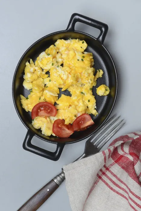 Framed Print : Scrambled eggs with tomatoes in a pan print Framed Print : Scrambled eggs with tomatoes in a pan print