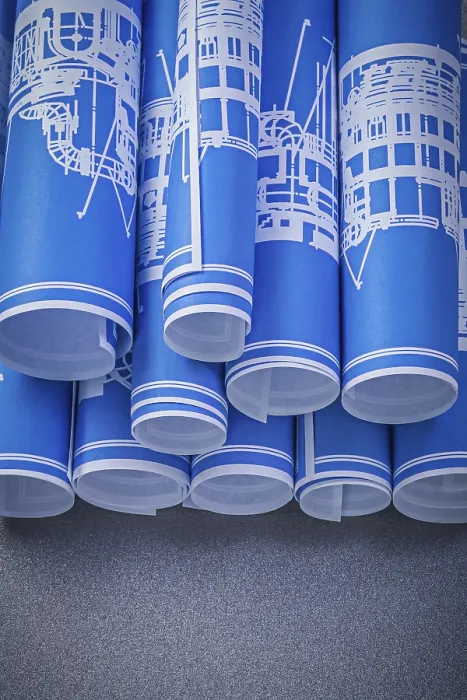 Framed Print : Blue Rolled Engineering Drawings Print on Grey Background Framed Print : Blue Rolled Engineering Drawings Print on Grey Background