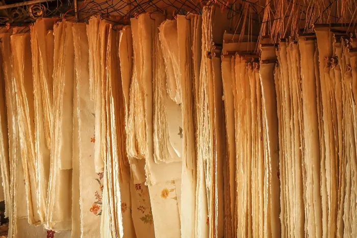 Framed Print : Sheets of Paper Hanging in a Traditional Print Framed Print : Sheets of Paper Hanging in a Traditional Print
