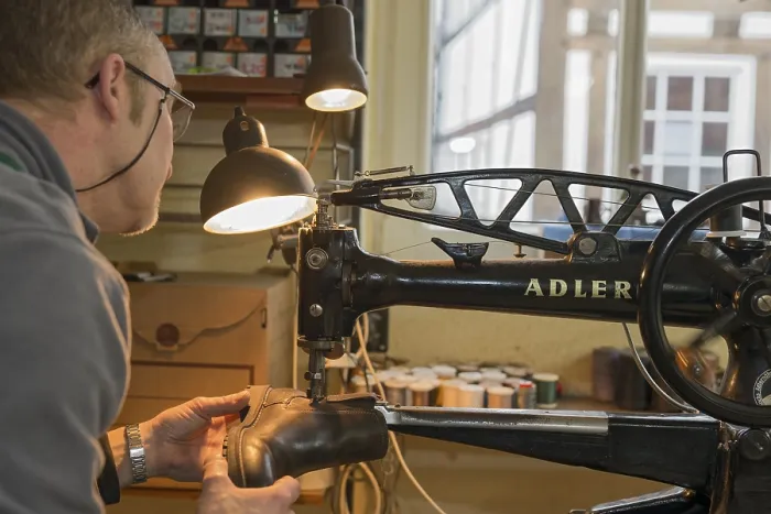 Framed Print : Shoemaker, Shoemaker Sews Shoe to Machine Print Framed Print : Shoemaker, Shoemaker Sews Shoe to Machine Print