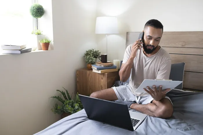 Framed Print : Full Shot Man Working in Bed Print Framed Print : Full Shot Man Working in Bed Print