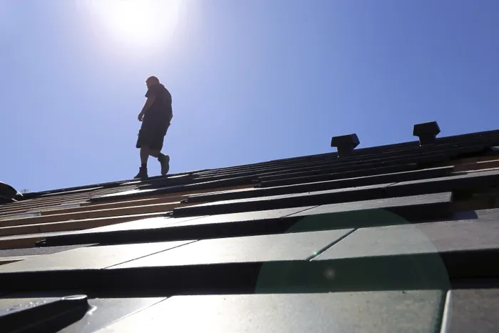 Framed Print : Silhouette of a Roofer Against the Light Print Framed Print : Silhouette of a Roofer Against the Light Print