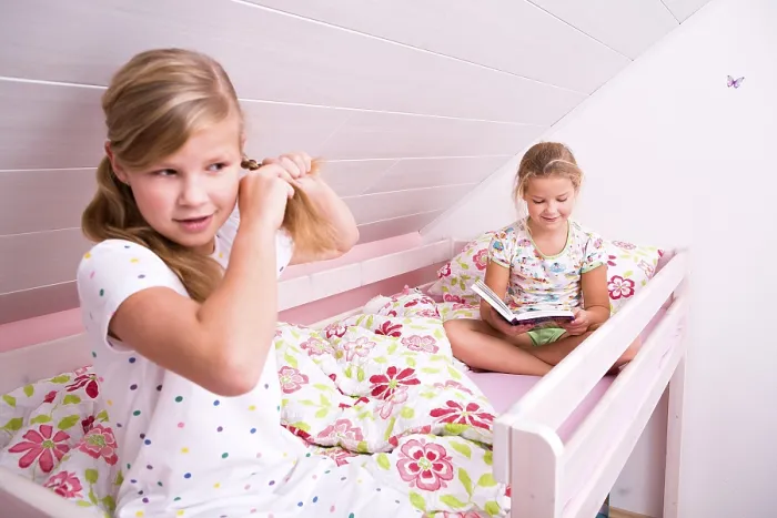 Framed Print : Sisters Reading a Book in Bed Print Framed Print : Sisters Reading a Book in Bed Print