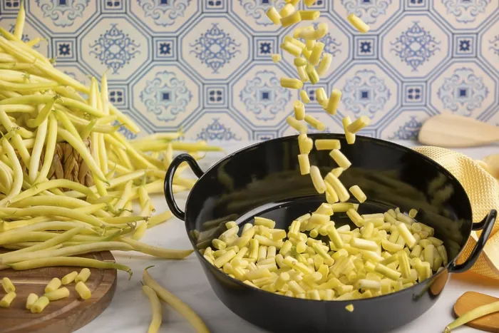 Framed Print : Sliced beans fall into a cooking pot kitchen worktop print Framed Print : Sliced beans fall into a cooking pot kitchen worktop print