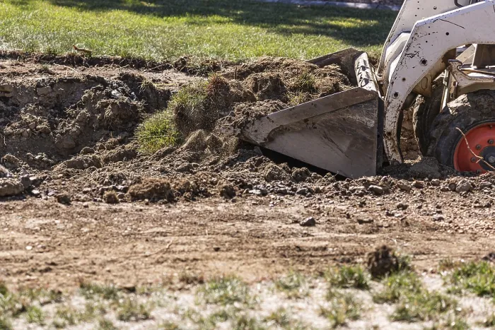 Framed Print : Small Bulldozer Digging in Yard for Pool Installation Print Framed Print : Small Bulldozer Digging in Yard for Pool Installation Print