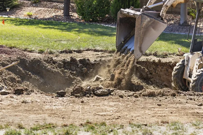 Framed Print : Small Bulldozer Digging in Yard - Print Framed Print : Small Bulldozer Digging in Yard - Print