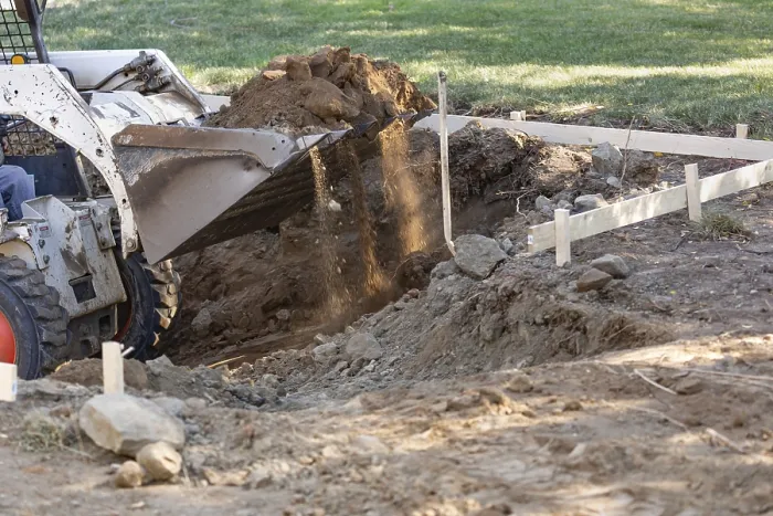 Framed Print : Small Bulldozer Digging in Yard for Pool Installation Print Framed Print : Small Bulldozer Digging in Yard for Pool Installation Print