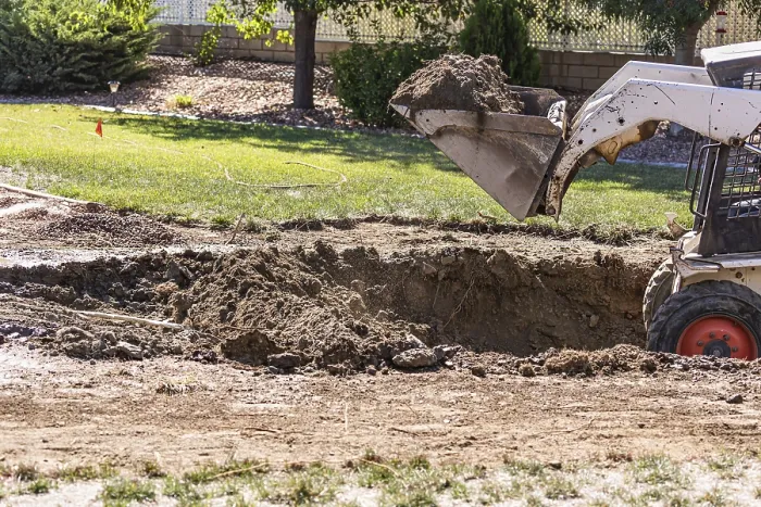 Framed Print : Small Bulldozer Digging in Yard for Pool Installation Print Framed Print : Small Bulldozer Digging in Yard for Pool Installation Print