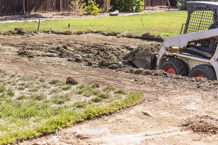 Framed Print : Small Bulldozer Digging in Yard for Pool Installation Print Framed Print : Small Bulldozer Digging in Yard for Pool Installation Print