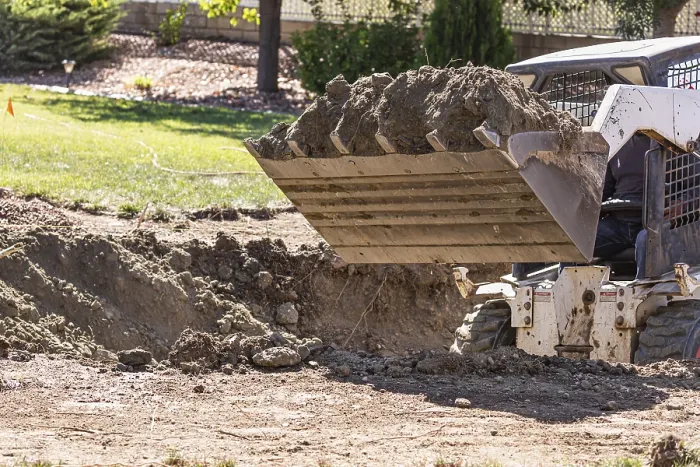 Framed Print : Small Bulldozer Digging in Yard for Pool Installation Print Framed Print : Small Bulldozer Digging in Yard for Pool Installation Print
