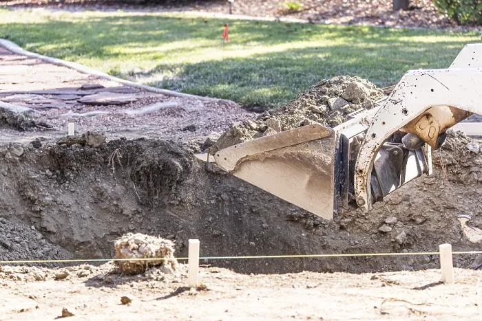 Framed Print : Small Bulldozer Digging in Yard for Pool Installation Print Framed Print : Small Bulldozer Digging in Yard for Pool Installation Print