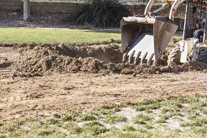 Framed Print : Small Bulldozer Digging in Yard for Pool Installation Print Framed Print : Small Bulldozer Digging in Yard for Pool Installation Print