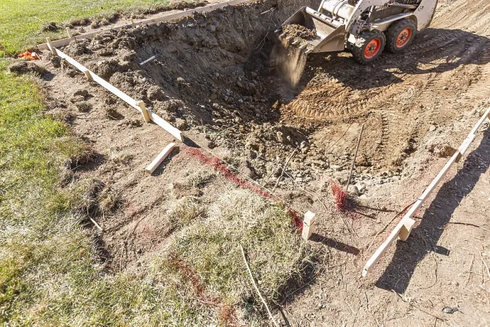 Framed Print : Small Bulldozer Digging in Yard for Pool Installation Print Framed Print : Small Bulldozer Digging in Yard for Pool Installation Print