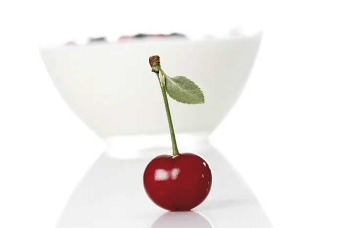 Framed Print : Sour Cherry in Front of Yoghurt Print Framed Print : Sour Cherry in Front of Yoghurt Print