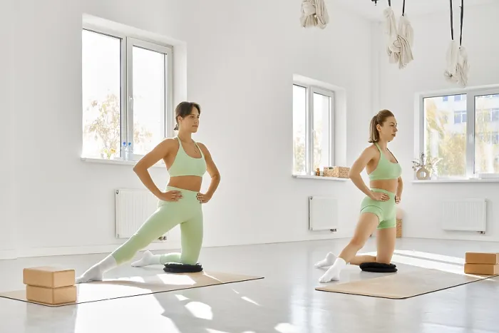 Framed Print : Women Practicing Yoga in a Spacious Studio Print Framed Print : Women Practicing Yoga in a Spacious Studio Print