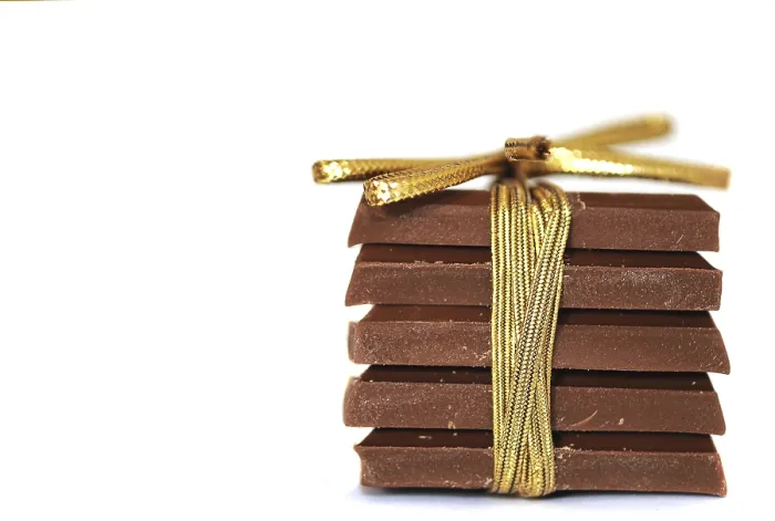 Framed Print : Stack of Chocolate with Ribbon Print Framed Print : Stack of Chocolate with Ribbon Print
