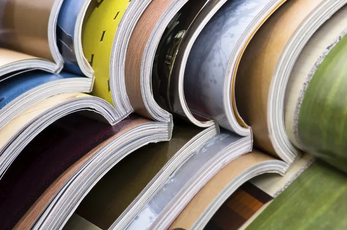 Framed Print : Stack of Open Magazines Print Framed Print : Stack of Open Magazines Print