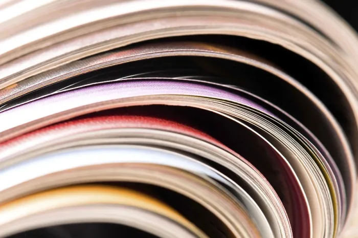 Framed Print : Stack of Open Magazines Print Framed Print : Stack of Open Magazines Print