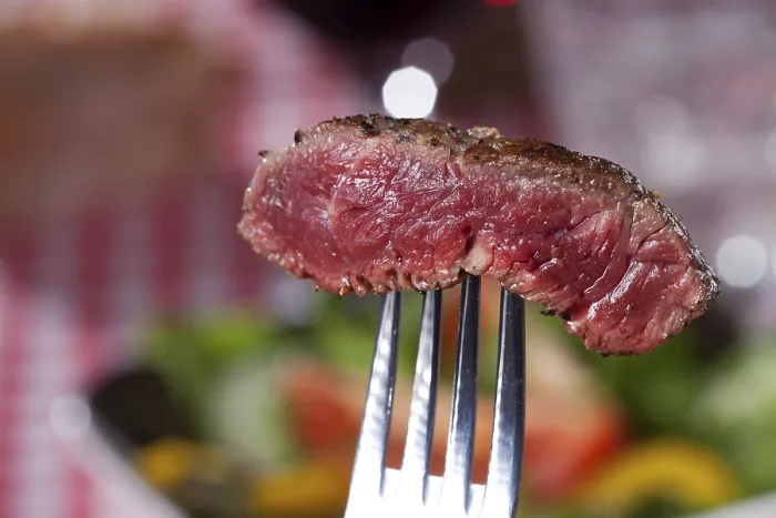 Framed Print : Steak on a fork over the salad Print Framed Print : Steak on a fork over the salad Print