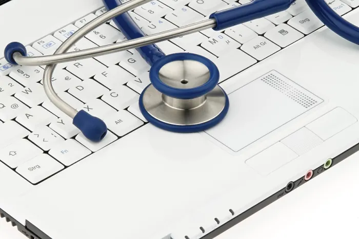 Framed Print : Stethoscope on Laptop Computer Print - Secure Internet Data Framed Print : Stethoscope on Laptop Computer Print - Secure Internet Data