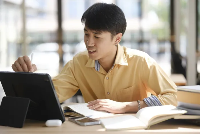 Framed Print : A Student Engaged in Online Learning Print Framed Print : A Student Engaged in Online Learning Print